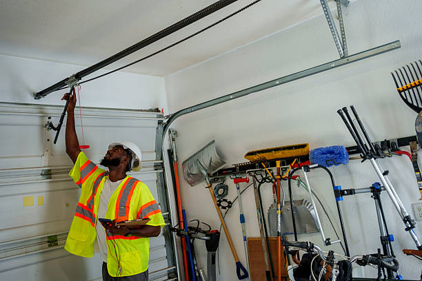 Professional Garage Door Panel Replacement technician working in Springs, NY